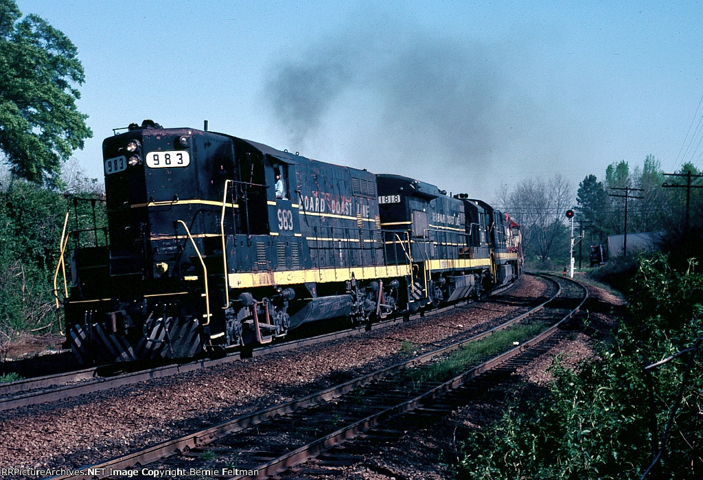 Seaboard Coast Line GP7 #983, U36B 1818, U30C 2122 & Frisco SD45 928 lead SCL/Frisco train #334 